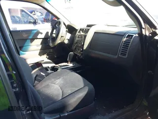 2011 Mazda Tribute Sport with VIN 4F2CY9C7XBKM06202, listed as a IAAI auction lot 41281197 with 195,443 mi miles and . Bid and sale history available at DreamBid. Image 5.