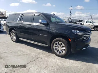 2023 Chevrolet Suburban Premier with VIN 1GNSKFKD8PR205665, listed as a Copart auction lot 51694655 with 27,882 mi miles and Salvage title. Bid and sale history available at DreamBid. Image 4.