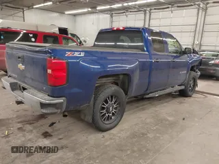 2014 Chevrolet Silverado 1500 LT with VIN 1GCVKREC2EZ155062, listed as a IAAI auction lot 41260471 with 135,762 mi miles and . Bid and sale history available at DreamBid. Image 4.