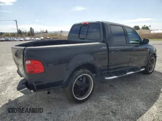 2003 Ford F-150 XLT with VIN 1FTRW07L33KB17103, listed as a Copart auction lot 49471045 with 194,367 mi miles and Salvage Title. Bid and sale history available at carsss.com. Image 3.
