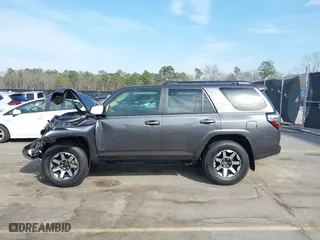 2021 Toyota 4Runner TRD Off Road with VIN JTEPU5JR0M5877962, listed as a IAAI auction lot 41683297 with 61,539 mi miles. Bid and sale history available at carsss.com. Image 14.