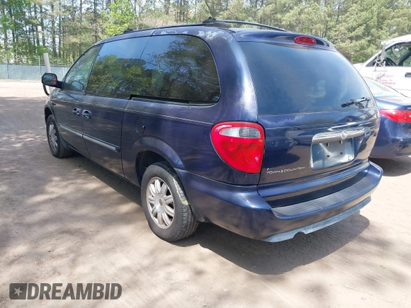 2005 Chrysler Town & Country Touring with VIN 2C8GP54L95R181669, listed as a IAAI auction lot 42065243 with 183,285 mi miles. Bid and sale history available at carsss.com. Image 3.