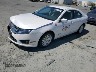 2012 Ford Fusion Hybrid с VIN 3FADP0L33CR328512, выставлен на аукционе Copart как лот 64605465 с пробегом 17 327 миль миль и Списание • Salvage title. История ставок и продаж доступна на DreamBid. Изображение 1.