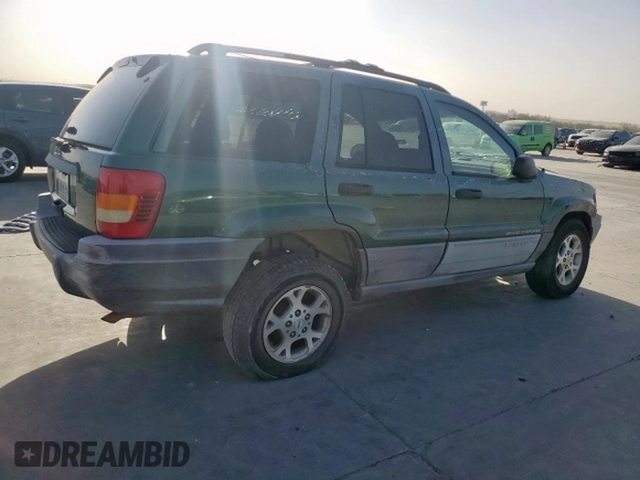 1999 Jeep Grand Cherokee Laredo with VIN 1J4G258S0XC561054, listed as a Copart auction lot 49814555 with Not provided miles and Salvage title. Bid and sale history available at DreamBid. Image 3.