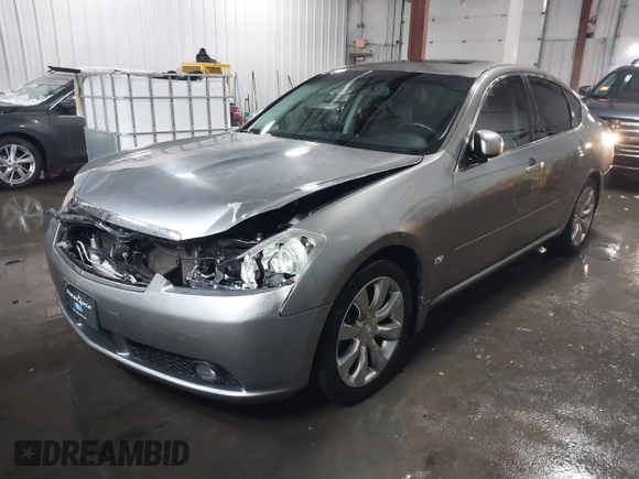 2006 Infiniti M z VIN JNKAY01E76M109160, wystawiony jako IAAI lot #41252984 z przebiegiem 134 744 mil mil oraz . Historia ofert i sprzedaży dostępna na DreamBid. Obrazek 17.