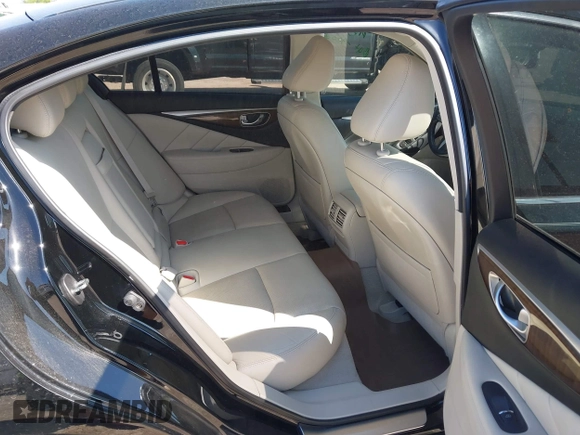 2014 Infiniti Q50 Premium z VIN JN1BV7AP2EM672661, wystawiony jako IAAI lot #42319325 z przebiegiem 85 803 mil mil oraz . Historia ofert i sprzedaży dostępna na DreamBid. Obrazek 8.