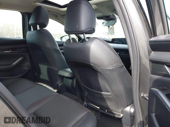 2023 Mazda 3 S Premium with VIN 3MZBPBDM8PM373434, listed as a IAAI auction lot 41234729 with 9,387 mi miles and . Bid and sale history available at DreamBid. Image 8.