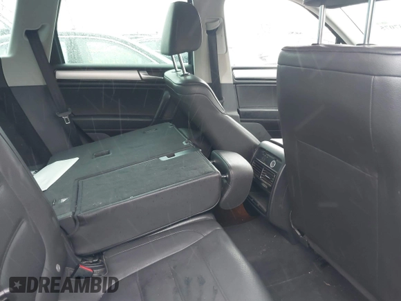2013 Volkswagen Touareg Lux with VIN WVGEF9BP7DD007170, listed as a IAAI auction lot 41787075 with 131,089 mi miles and . Bid and sale history available at DreamBid. Image 8.