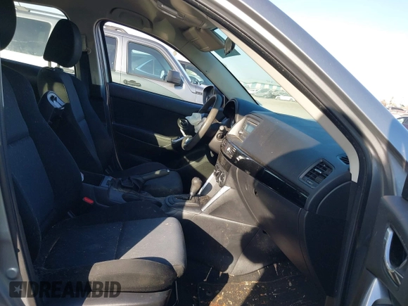 2014 Mazda CX-5 Sport with VIN JM3KE2BE9E0330345, listed as a IAAI auction lot 41377335 with 103,340 mi miles and . Bid and sale history available at carsss.com. Image 5.