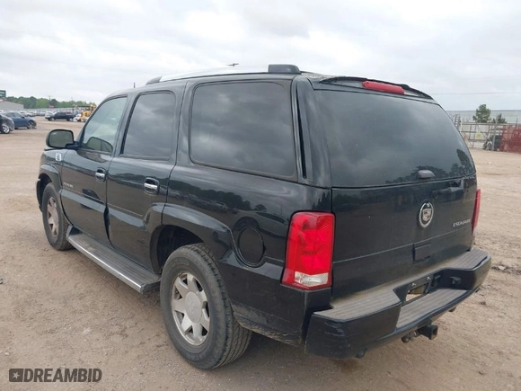 2005 Cadillac Escalade with VIN 1GYEC63TX5R203156, listed as a IAAI auction lot 41937137 with 239,919 mi miles. Bid and sale history available at carsss.com. Image 3.