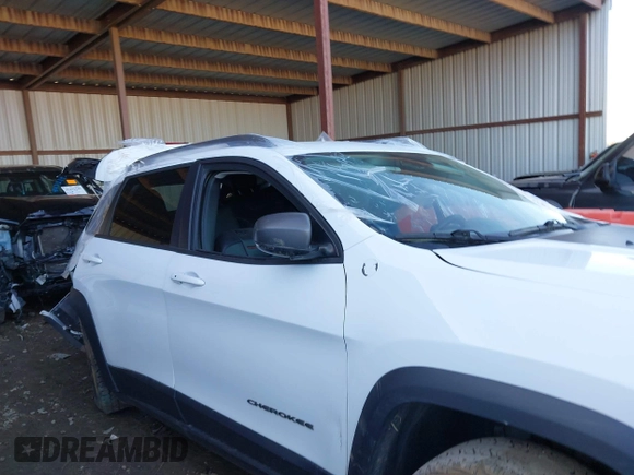 2021 Jeep Cherokee Trailhawk with VIN 1C4PJMBX4MD153086, listed as a IAAI auction lot 41132030 with 56,367 mi miles and . Bid and sale history available at DreamBid. Image 13.