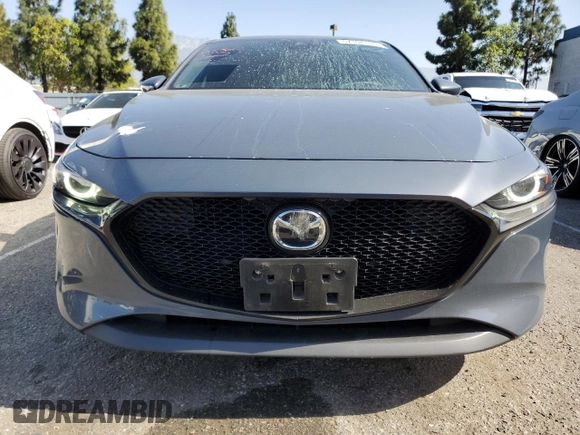 2022 Mazda 3 Premium with VIN JM1BPAML8N1511424, listed as a Copart auction lot 57108135 with 52,791 mi miles and Salvage title. Bid and sale history available at DreamBid. Image 5.