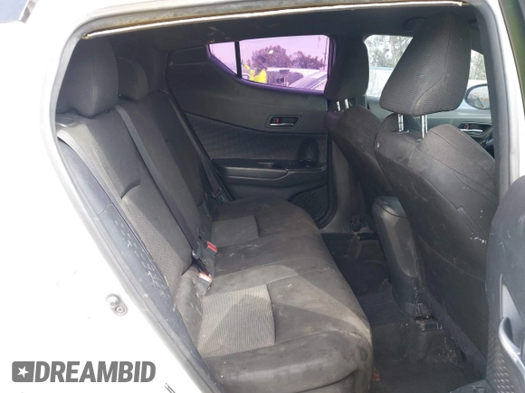 2019 Toyota C-HR XLE with VIN JTNKHMBX9K1054053, listed as a IAAI auction lot 42120256 with 67,083 mi miles and . Bid and sale history available at DreamBid. Image 8.