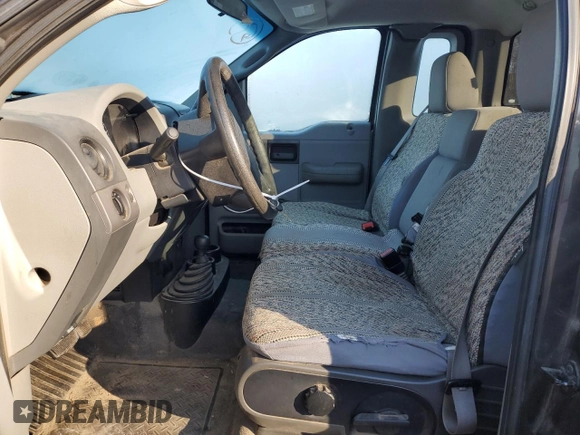 2005 Ford F-150 XL with VIN 1FTRF14W65NB91606, listed as a Copart auction lot 84889894 with 157,947 mi miles and Salvage Title. Bid and sale history available at carsss.com. Image 7.