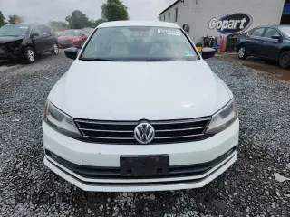 2015 Volkswagen Jetta SE z VIN 3VWD17AJ7FM220222, wystawiony jako Copart lot #62866345 z przebiegiem 68 273 mil mil oraz Szkoda całkowita • Salvage title. Historia ofert i sprzedaży dostępna na DreamBid. Obrazek 5.
