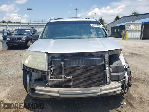 2009 Honda Pilot LX with VIN 5FNYF48259B040040, listed as a Copart auction lot 59860445 with 213,459 mi miles and Salvage title. Bid and sale history available at DreamBid. Image 5.
