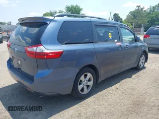 2015 Toyota Sienna LE AAS with VIN 5TDKK3DC1FS642029, listed as a IAAI auction lot 42618738 with 201,344 mi miles and . Bid and sale history available at DreamBid. Image 4.