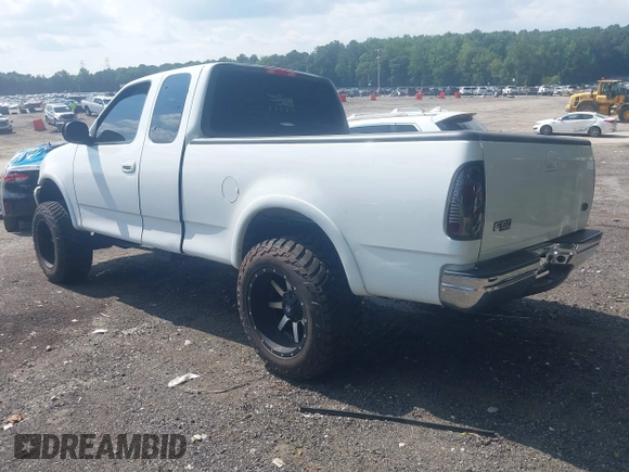 2001 Ford F-150 XL with VIN 1FTRX18L71NB11026, listed as a IAAI auction lot 42590063 with 218,156 mi miles and . Bid and sale history available at DreamBid. Image 3.