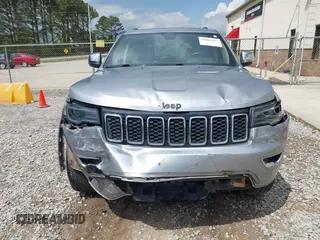 2017 Jeep Grand Cherokee Limited with VIN 1C4RJEBG4HC765329, listed as a IAAI auction lot 42008297 with 194,607 mi miles and . Bid and sale history available at DreamBid. Image 6.