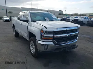 2018 Chevrolet Silverado 1500 LT with VIN 3GCPCREC6JG520455, listed as a IAAI auction lot 41948758 with 107,188 mi miles and . Bid and sale history available at DreamBid. Image 1.