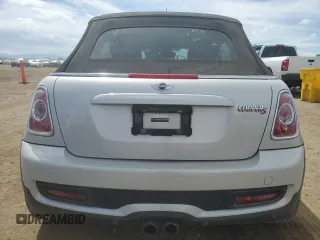 2015 MINI Convertible S z VIN WMWZP3C52FT298857, wystawiony jako Copart lot #58149145 z przebiegiem 52 777 mil mil oraz Szkoda całkowita • Salvage title. Historia ofert i sprzedaży dostępna na DreamBid. Obrazek 6.