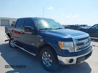 2014 Ford F-150 XL with VIN 1FTFW1ETXEKE81033, listed as a IAAI auction lot 42053098 with 150,504 mi miles and . Bid and sale history available at DreamBid. Image 1.