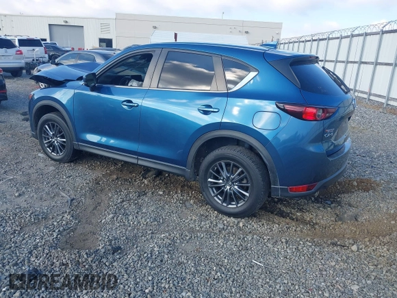 2020 Mazda CX-5 Touring with VIN JM3KFACM0L0775020, listed as a IAAI auction lot 40876970 with 96,424 mi miles. Bid and sale history available at carsss.com. Image 3.
