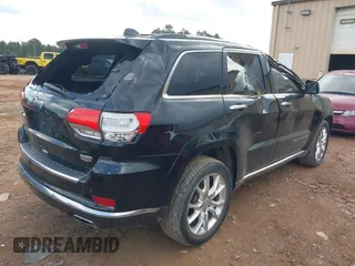 2015 Jeep Grand Cherokee Summit with VIN 1C4RJFJT1FC768707, listed as a IAAI auction lot 41863454 with 122,564 mi miles. Bid and sale history available at carsss.com. Image 4.