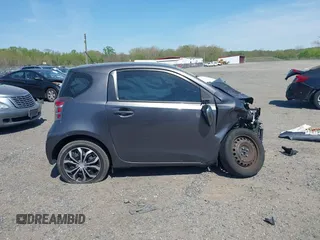 2012 Scion iQ z VIN JTNJJXB0XCJ013923, wystawiony jako IAAI lot #42109295 z przebiegiem 119 937 mil mil oraz . Historia ofert i sprzedaży dostępna na DreamBid. Obrazek 13.