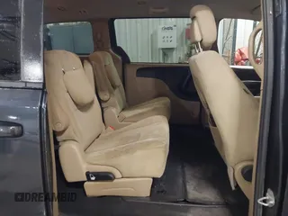 2014 Dodge Grand Caravan SXT with VIN 2C4RDGCGXER154709, listed as a IAAI auction lot 41117603 with 214,872 mi miles and . Bid and sale history available at DreamBid. Image 8.