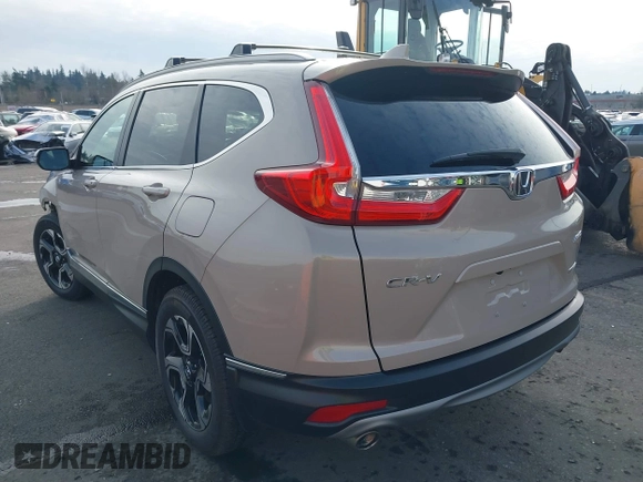 2017 Honda CR-V Touring with VIN 5J6RW2H99HL002127, listed as a IAAI auction lot 41517919 with 18,367 mi miles. Bid and sale history available at carsss.com. Image 3.