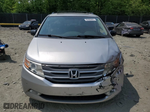 2012 Honda Odyssey Touring with VIN 5FNRL5H93CB121366, listed as a Copart auction lot 55383885 with 197,885 mi miles and Salvage title. Bid and sale history available at DreamBid. Image 5.