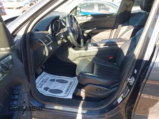 2016 Mercedes-Benz GL with VIN 4JGDF6EE3GA645328, listed as a IAAI auction lot 41502439 with 166,321 mi miles. Bid and sale history available at carsss.com. Image 5.