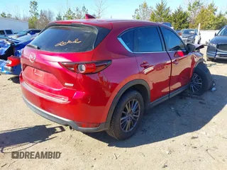2019 Mazda CX-5 Sport with VIN JM3KFBBM2K0508743, listed as a IAAI auction lot 41288659 with 77,710 mi miles and . Bid and sale history available at DreamBid. Image 4.
