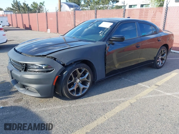 2015 Dodge Charger SXT with VIN 2C3CDXHG9FH915191, listed as a IAAI auction lot 41850427 with 164,535 mi miles and . Bid and sale history available at DreamBid. Image 2.
