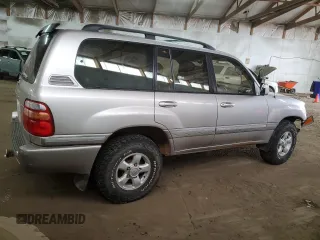 1999 Toyota Land Cruiser with VIN JT3HT05J1X0038590, listed as a Copart auction lot 87452404 with 232,244 mi miles and Salvage Title. Bid and sale history available at carsss.com. Image 3.
