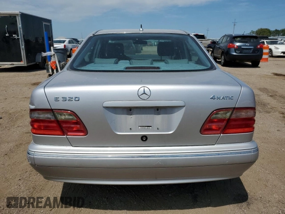 2002 Mercedes-Benz E-Class with VIN WDBJF82J92X065591, listed as a Copart auction lot 65841964 with 155,195 mi miles and Salvage Title. Bid and sale history available at carsss.com. Image 6.