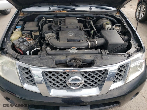 2012 Nissan Pathfinder S with VIN 5N1AR1NB9CC610228, listed as a Copart auction lot 71107974 with 105,960 mi miles and Salvage Title. Bid and sale history available at carsss.com. Image 12.