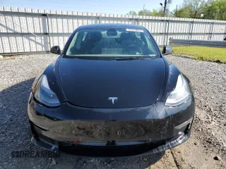 2022 Tesla Model 3 with VIN 5YJ3E1EAXNF286180, listed as a Copart auction lot 52299105 with 129,824 mi miles and Clean Title. Bid and sale history available at carsss.com. Image 5.