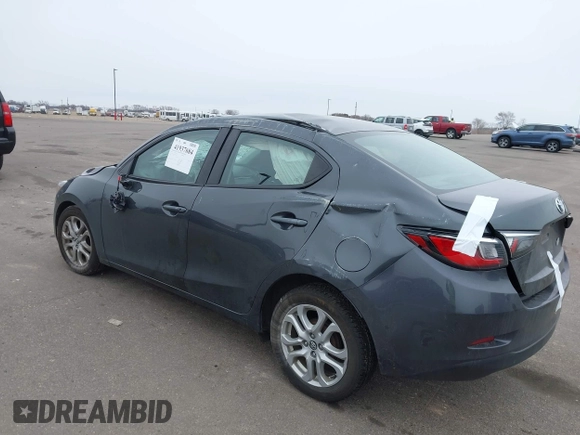 2018 Toyota Yaris with VIN 3MYDLBYV9JY321158, listed as a IAAI auction lot 41937684 with 85,020 mi miles and . Bid and sale history available at DreamBid. Image 3.