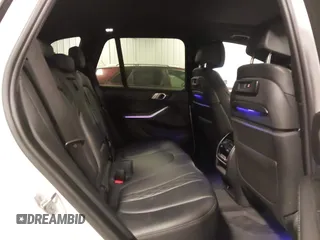 2020 BMW X5 xDrive40i with VIN 5UXCR6C01LLL66648, listed as a IAAI auction lot 42372631 with 59,770 mi miles and . Bid and sale history available at DreamBid. Image 8.