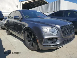 2018 Bentley Bentayga Signature z VIN SJAAC2ZV7JC019555, wystawiony jako Copart lot #88089665 z przebiegiem 50 323 mil mil oraz Szkody całkowita. Historia ofert i sprzedaży dostępna na DreamBid. Obrazek 4.