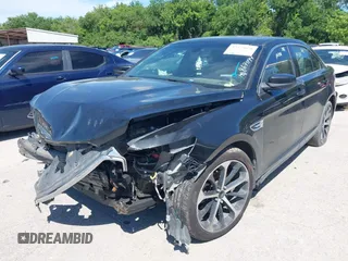 2014 Ford Taurus SEL with VIN 1FAHP2E8XEG133992, listed as a IAAI auction lot 42223678 with 201,204 mi miles and . Bid and sale history available at carsss.com. Image 2.