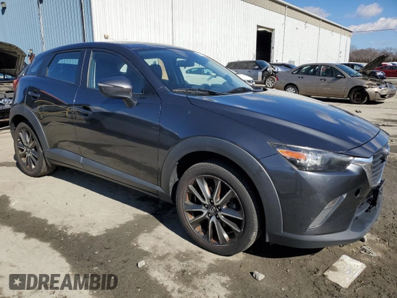 2017 Mazda CX-3 Touring with VIN JM1DKFC71H0159435, listed as a Copart auction lot 47443125 with 104,025 mi miles and Clean Title. Bid and sale history available at DreamBid. Image 4.