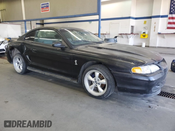 1997 Ford Mustang with VIN 1FALP4047VF158249, listed as a Copart auction lot 55669455 with 175,458 mi miles and Salvage title. Bid and sale history available at DreamBid. Image 4.