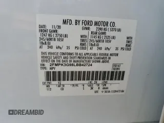 2020 Ford Edge SE z VIN 2FMPK3G98LBB42724, wystawiony jako Copart lot #49602455 z przebiegiem Nie podano mil oraz Nie do naprawy • Non repairable. Historia ofert i sprzedaży dostępna na DreamBid. Obrazek 13.