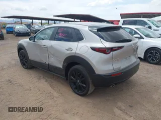 2024 Mazda CX-30 S Select Sport with VIN 3MVDMBBM3RM657918, listed as a IAAI auction lot 42218316 with 27,595 mi miles and . Bid and sale history available at carsss.com. Image 3.