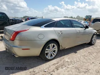 2013 Jaguar XJ Portfolio with VIN SAJWJ2GD5D8V49505, listed as a Copart auction lot 61171955 with 129,158 mi miles and Salvage title. Bid and sale history available at DreamBid. Image 3.