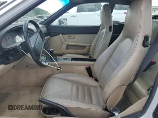 1987 Porsche 944 с VIN WP0AA094XHN450664, выставлен на аукционе Copart как лот 57918205 с пробегом 115 949 миль миль и Списание • Salvage title. История ставок и продаж доступна на DreamBid. Изображение 7.