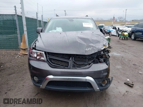 2020 Dodge Journey Crossroad z VIN 3C4PDCGB4LT271100, wystawiony jako IAAI lot #41552975 z przebiegiem 74 400 mil mil oraz . Historia ofert i sprzedaży dostępna na DreamBid. Obrazek 13.